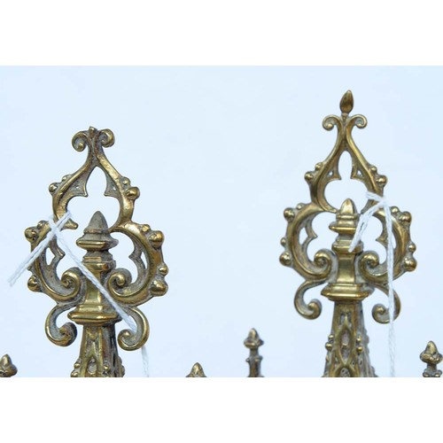 962 - A pair of Victorian brass gothic twin branch candelabra, c1870, 30cm h