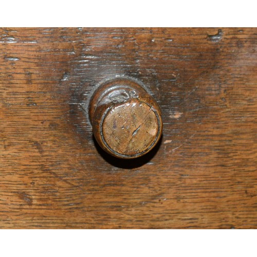 1122 - A William III oak chest of four geometrically moulded drawers, possibly East Anglian, late 17th c, o... 