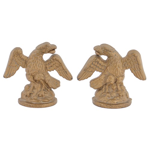 772 - A pair of Victorian cast iron eagle doorstops, 18cm h