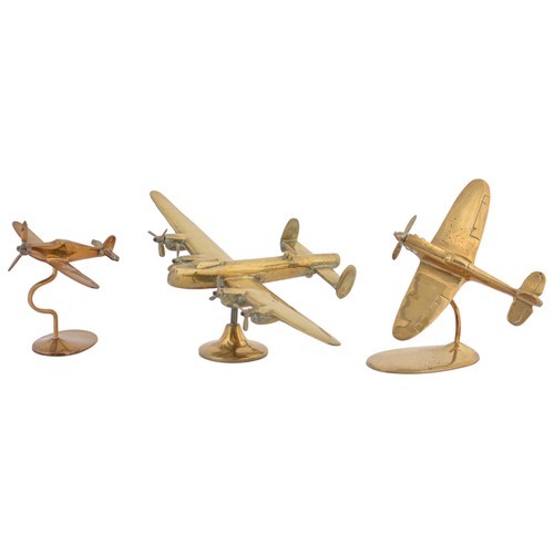 773 - Three World War Two brass models of aircraft, Lancaster 24.5cm l