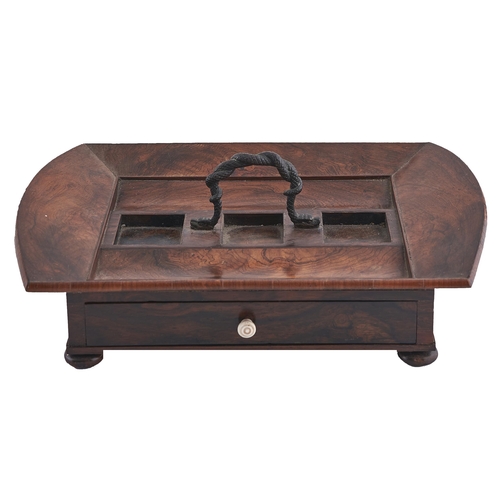 234 - An early Victorian rosewood inkstand, with sloping sides and curved ends centred by a bronze carryin... 