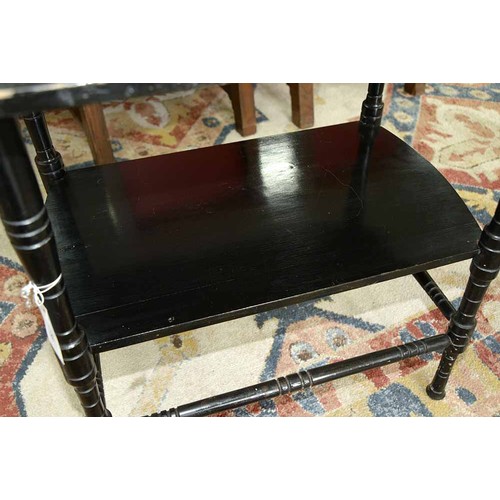 559 - A Victorian 'Anglo-Japanese' ebonised two tier occasional table, the design in the manner of E W God... 