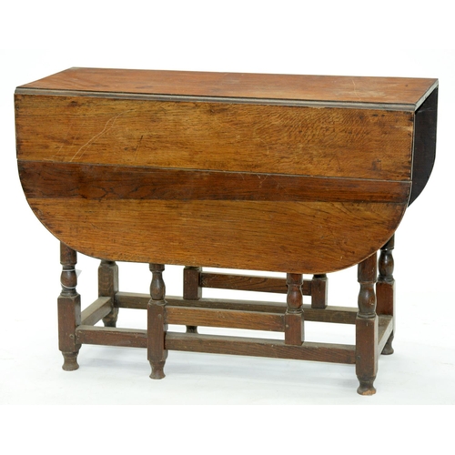 563 - An oak gateleg table, late 19th c, 73cm h; 100 x 119cm