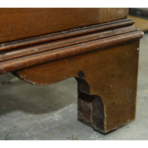 570 - A mahogany bookcase, early 19th c, with stepped cornice and figured frieze, fitted with adjustable s... 