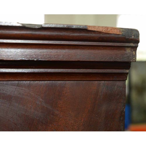 570 - A mahogany bookcase, early 19th c, with stepped cornice and figured frieze, fitted with adjustable s... 