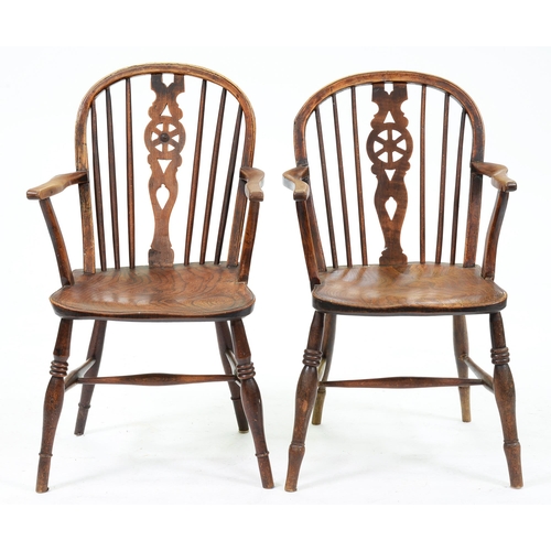 615 - Two Victorian ash Windsor chairs, Thames Valley Region, with wheel splat and elm seat, one with yew ... 