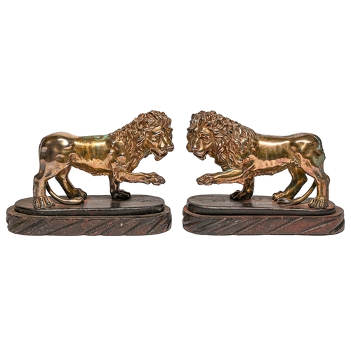 136 - A pair of electroformed bronzed metal sculptures of lions, on wood base, 14cm h