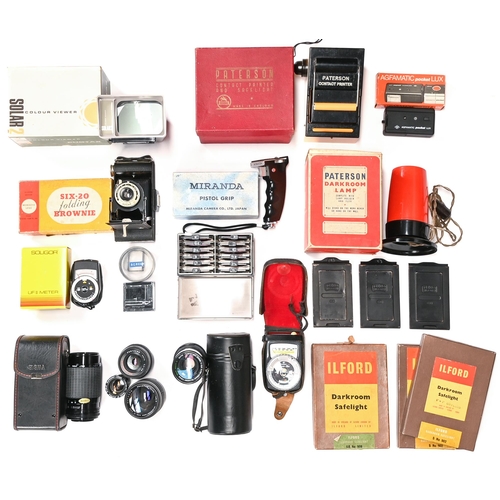 218 - A vintage Paterson contact printer and safe light, boxed, other dark room equipment, three lenses, f... 