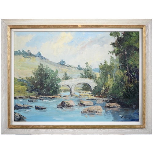 330 - C Wyegman, 20th c - Mountainous Landscape with Bridge, signed, oil on canvas, 50 x 70cm... 