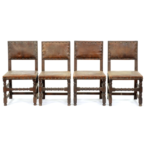 517 - A set of four oak chairs, early 20th c, in Charles I style, the padded back and stuffed over seat co... 