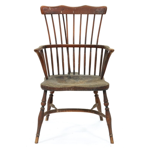 527 - An ash comb back Windsor armchair, Thames Valley or Lincolnshire, first half 19th c, with spindle ba... 