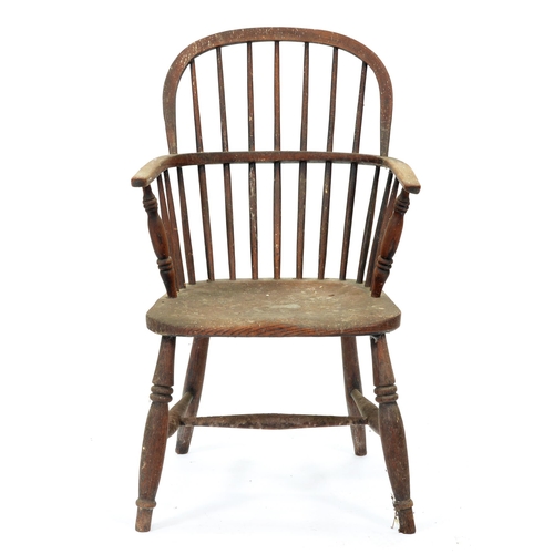 531 - An ash low back Windsor chair, Lincolnshire, mid 19th c, with spindle back, turned arm supports and ... 