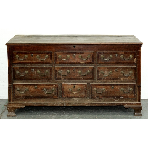 545 - A George III oak and crossbanded 'Lancashire' mule chest, the brass escutcheons and loop handles app... 