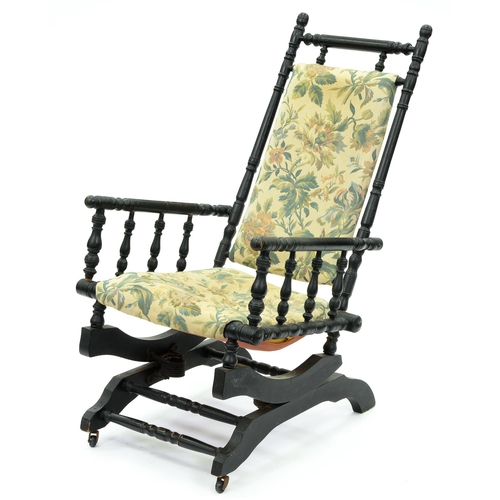 618 - An ebonised American rocking chair, c1900