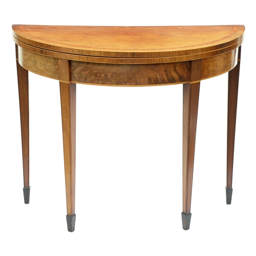 642 - A George III mahogany tea table, crossbanded in satinwood and line inlaid, on square tapered and spa... 