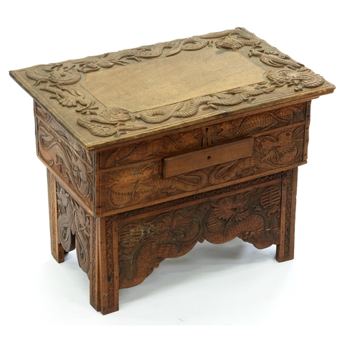 645 - A Chinese carved wood collapsible table, early 20th c, the top and all sides decorated with phoenix ... 