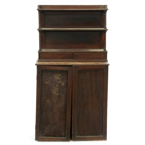 646 - A Regency mahogany bookcase, fitted with adjustable shelves enclosed by panelled doors, the sides al... 