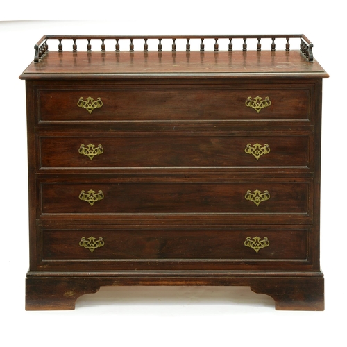 654 - A Northern European mahogany secretaire chest, late 19th c, with three quarter gallery and pierced b... 