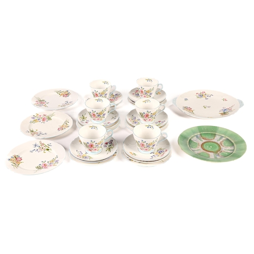 69 - A Shelley bone china Wild Flowers pattern tea service, mid 20th c, plate 26cm over handles, printed ... 