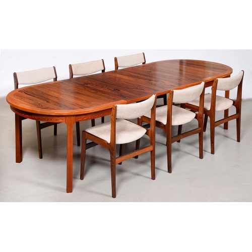 693 - A rosewood dining table, c1970, 73cm h; 100 x 265cm (chairs not included)