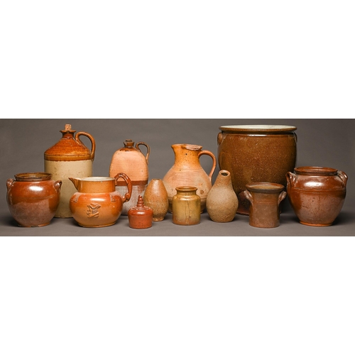 99 - Miscellaneous saltglazed brown stoneware jugs, jars and flagons, mid 19th c and later and an ochre d... 