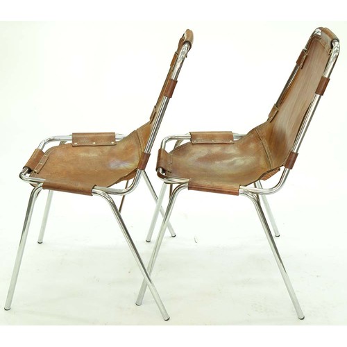 628 - A pair of mid-century modern Les Arcs chairs, the design specified by Charlotte Perriand for the Fre... 