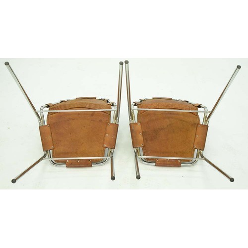 628 - A pair of mid-century modern Les Arcs chairs, the design specified by Charlotte Perriand for the Fre... 