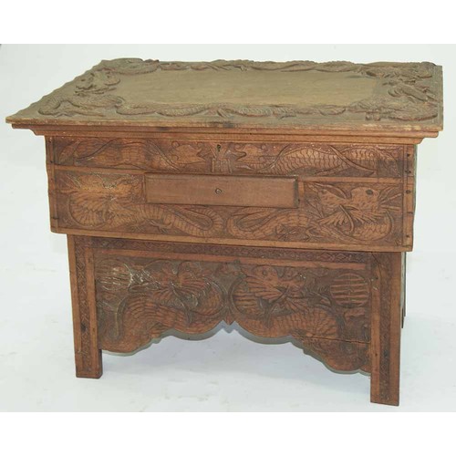 645 - A Chinese carved wood collapsible table, early 20th c, the top and all sides decorated with phoenix ... 