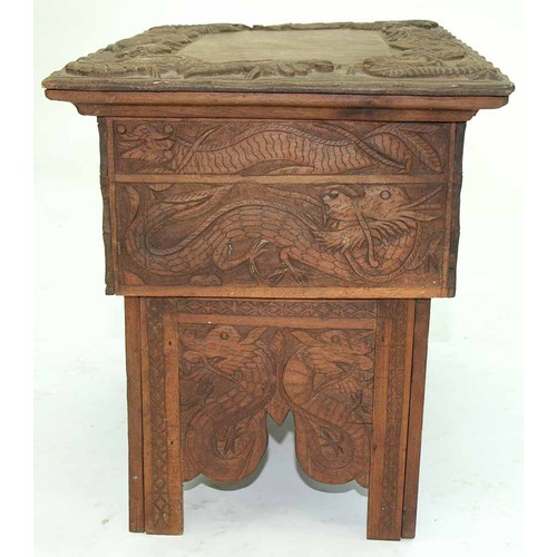 645 - A Chinese carved wood collapsible table, early 20th c, the top and all sides decorated with phoenix ... 