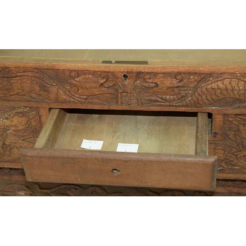 645 - A Chinese carved wood collapsible table, early 20th c, the top and all sides decorated with phoenix ... 