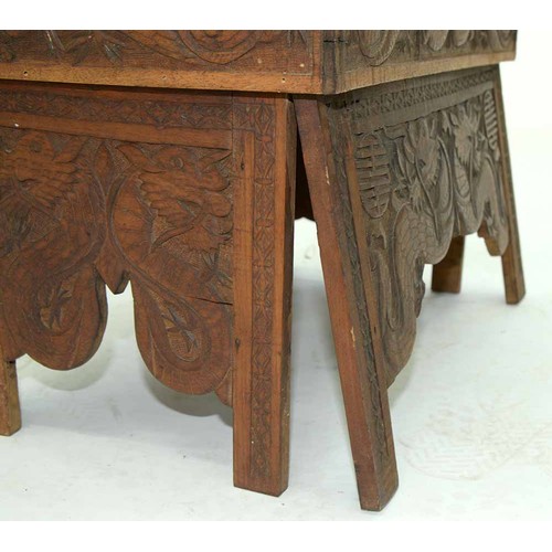 645 - A Chinese carved wood collapsible table, early 20th c, the top and all sides decorated with phoenix ... 