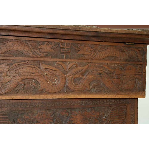 645 - A Chinese carved wood collapsible table, early 20th c, the top and all sides decorated with phoenix ... 