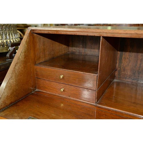 652 - A George III padouk bureau, late 18th c, with brass handles and escutcheons, bracket feet, 103cm h; ... 