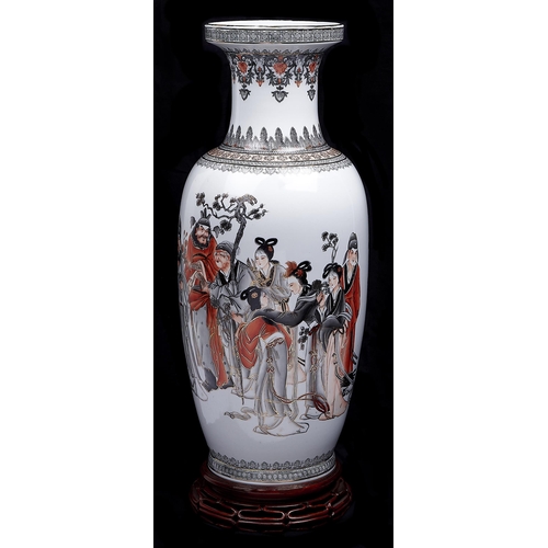 616 - A Chinese porcelain vase, intricately enamelled in black and red with immortals and attendants, the ... 