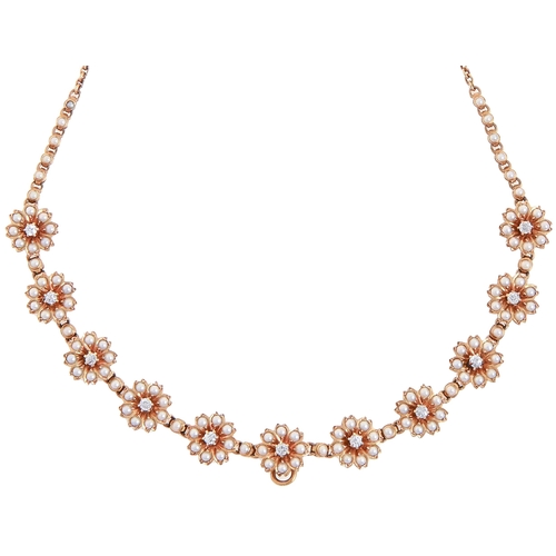 100 - A diamond and split pearl necklet, early 20th c, the eleven flower clusters divided by single split ... 