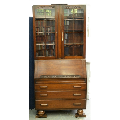 1018 - An oak bureau-cabinet, c1930, 198cm h; 43 x 91cm