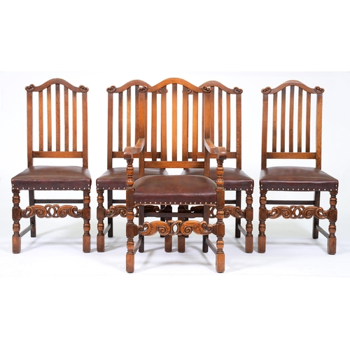 1108 - A set of five oak dining chairs, second quarter 20th c, with lath back, the set including an elbow c... 