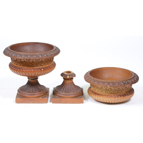 1110 - A pair of Victorian saltglazed brown stoneware garden vases, with egg-and-dart rim, on fluted foot a... 