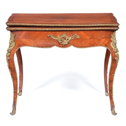 1121 - A French kingwood card table, 19th c, in Louis XV style, with ormolu mounts, the serpentine quarter ... 