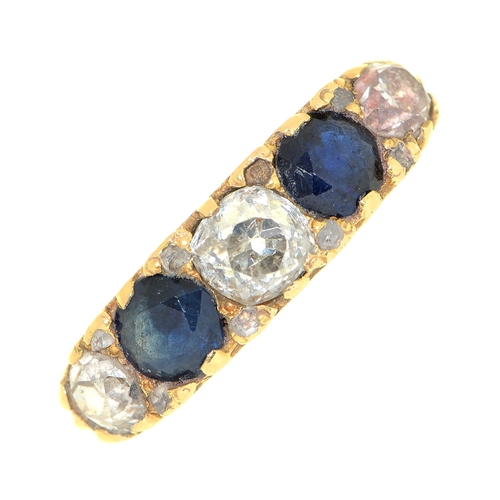 12 - A sapphire and  diamond five stone ring,  with old cut diamonds, in gold marked 18, other marks indi... 