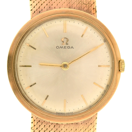 14 - An Omega 9ct gold gentleman's wristwatch, 31mm diam, on 9ct gold mesh bracelet with Omega device to ... 