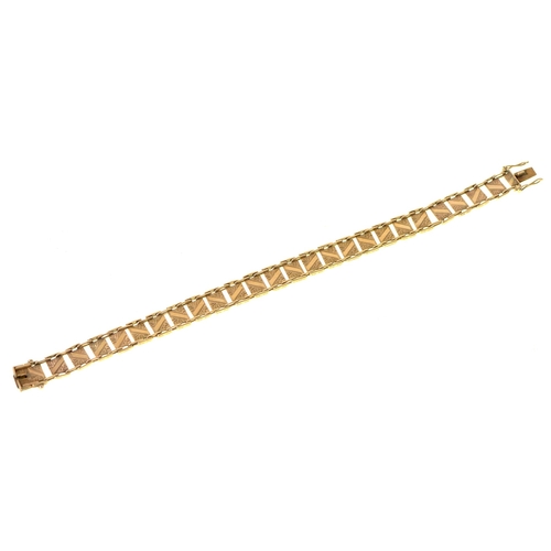 20 - A gold bracelet, composed of square links, 19cm l, marked 9ct, 10g