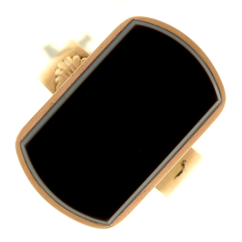23 - An onyx signet ring,  in gold, on gold band, unmarked, 8.4g, size S