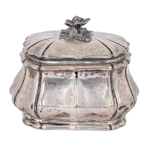 324 - A Continental silver tea caddy, probably German, c1880, of bombe form with naturalistic flower knop,... 