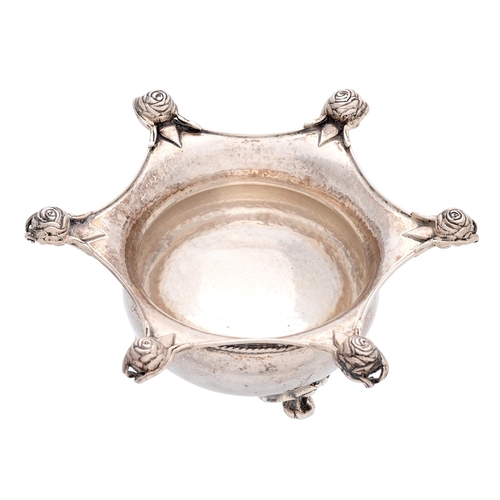 326 - Omar Ramsden. An Arts and Crafts silver bowl, of compressed form with cable girdle, the widely evert... 