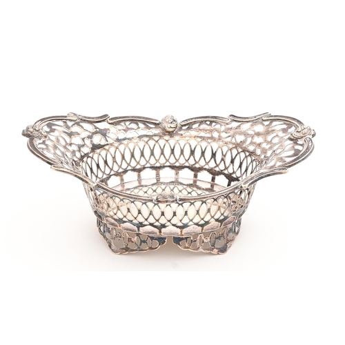 332 - An Edwardian pierced silver sweetmeat basket, the  rim applied with masks, 17cm l, by Cooper Bros &a... 