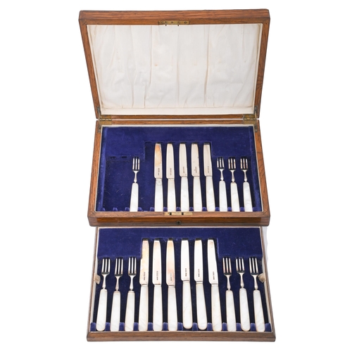 361 - A set of eleven George V mother of pearl hafted silver dessert knives and ten forks, by George Bisho... 