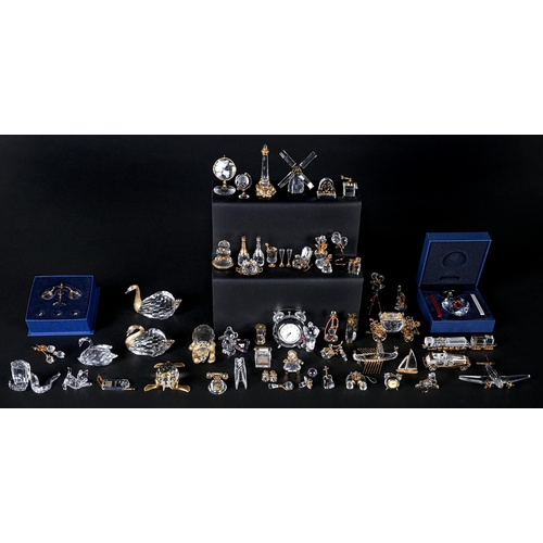 548 - A collection of Swarovski glass bibelots, late 20th / 21st c, for details please visit mellorsandkir... 