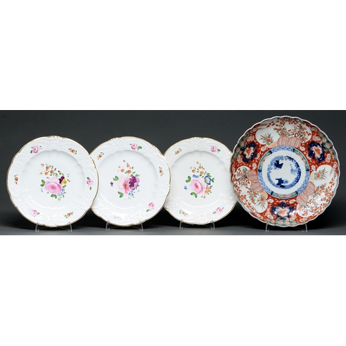 555 - Three Derby moulded plates, c1820, painted with flower sprays and single blooms, the rim gilt, 25cm ... 