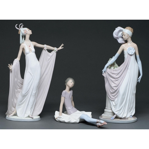 557 - Three Lladro figures of young women, 34cm h and smaller, printed mark